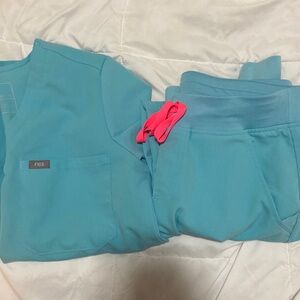 FIGS light blue scrub set with jogger style bottom